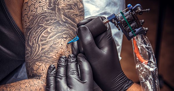Сморщенные от боли, но счастливые. В Киеве прошел фестиваль Tattoo Collection