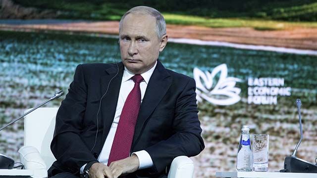 путін