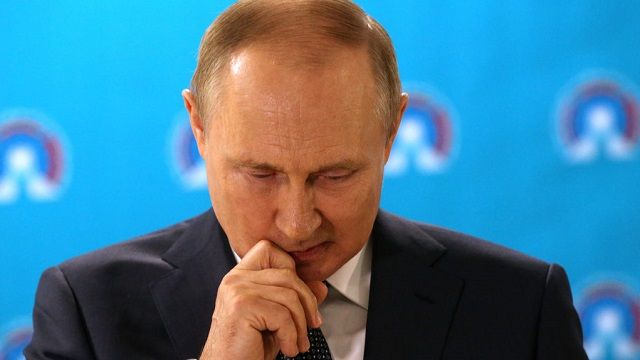 путін