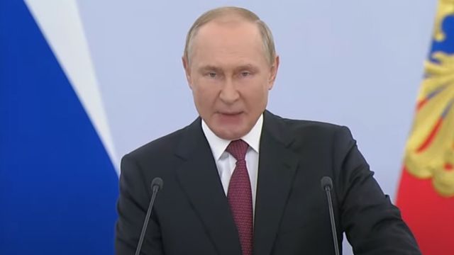 путін