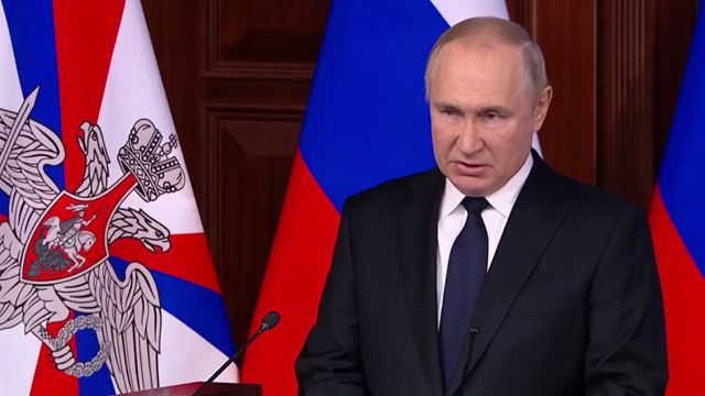 путін