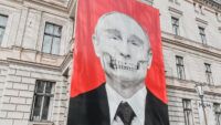 путін
