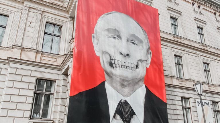 путін