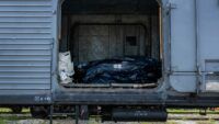 трупи російських окупантів у мішках