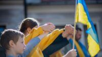 українці