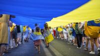 українці